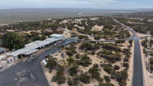 Eyre kelias ir lietuvių pakelės namų kompleksas ties Jūkla iš drono